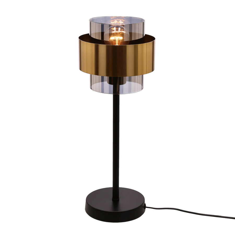 Vue trois quarts légèrement en hauteur, lampe allumée sur fond blanc neutre.