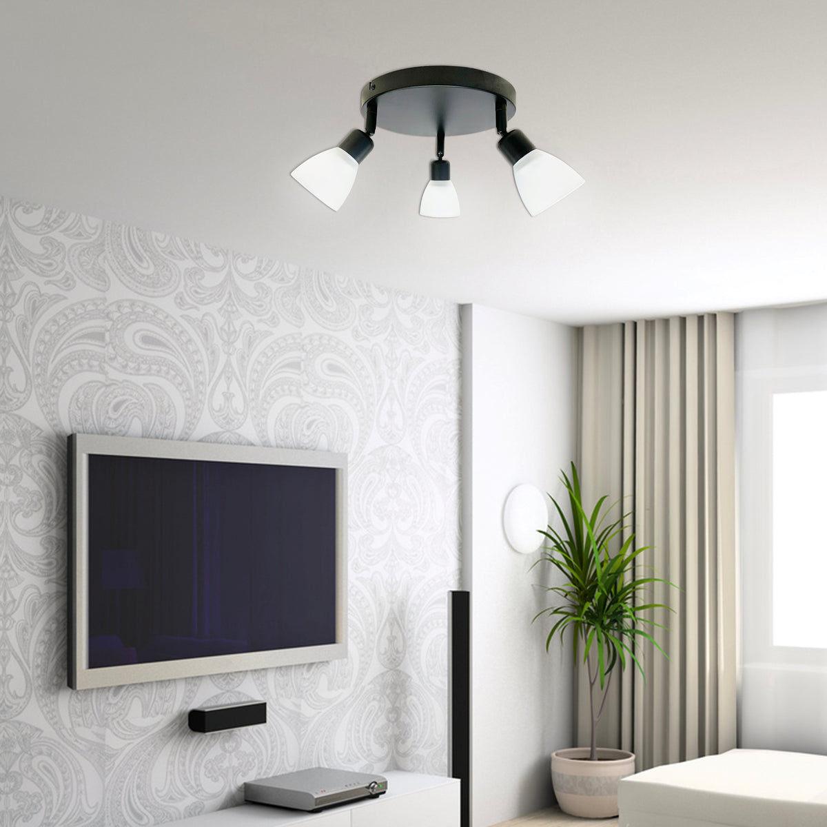 Mise en ambiance du plafonnier allumé dans un salon moderne avec mur orné