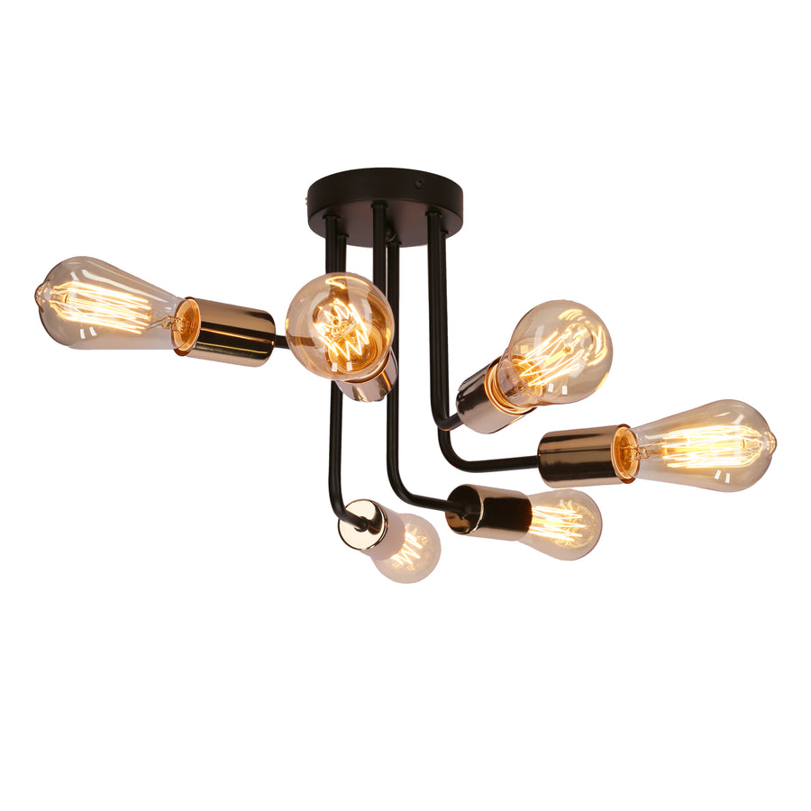 Détail des bras métalliques noirs et des douilles cuivrées du luminaire