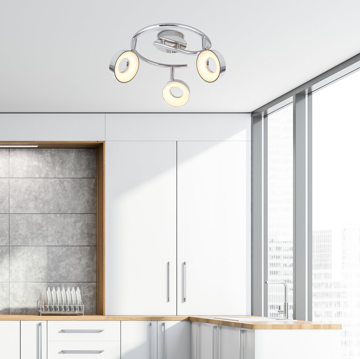 Luminaire installé au plafond d'une cuisine blanche moderne, ambiance en situation