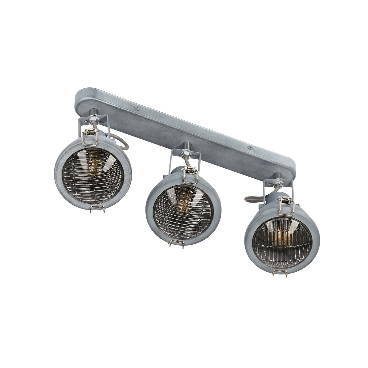 Vue plongeante montrant les trois projecteurs pivotants et leur grille avant