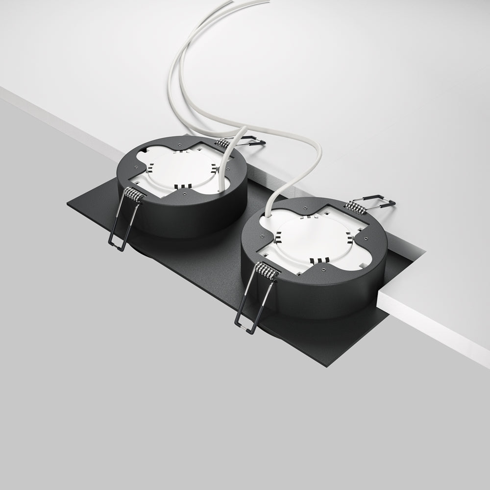 Vue arrière montrant les ressorts de fixation et le bloc driver du luminaire