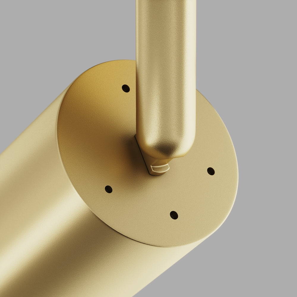 Détail du pivot doré et de la platine de fixation avec vis apparentes.