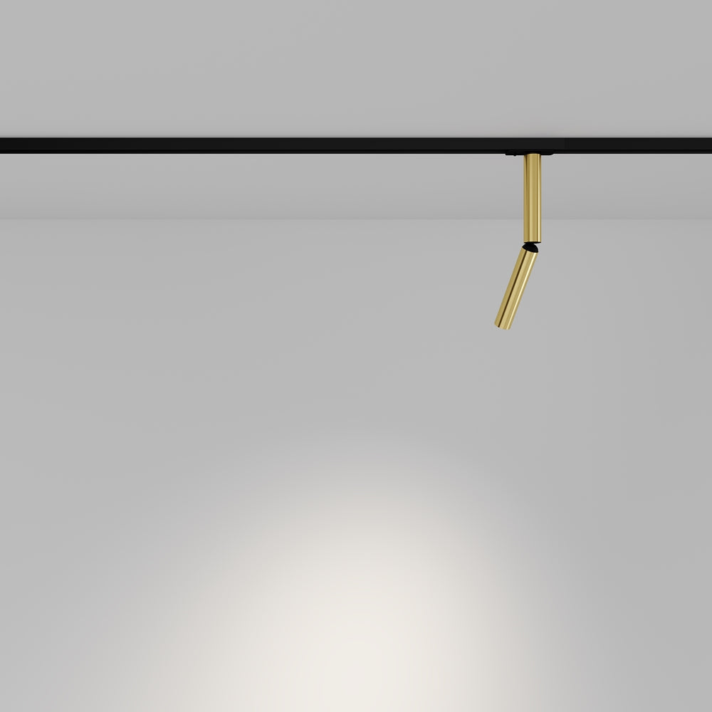 Mise en ambiance avec faisceau lumineux diffusé sous le spot doré incliné