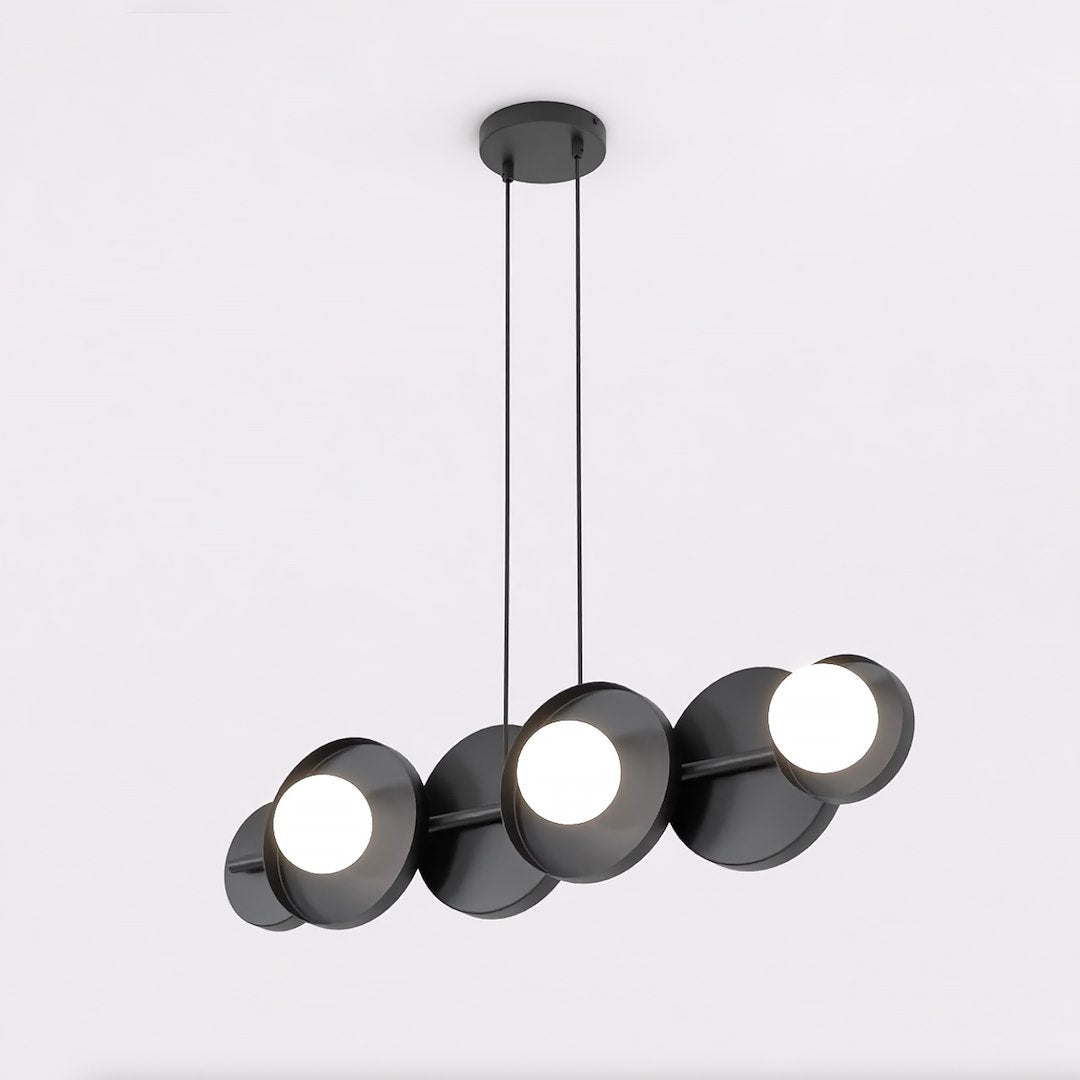 Vue en angle montrant le relief des disques noirs et des sources lumineuses