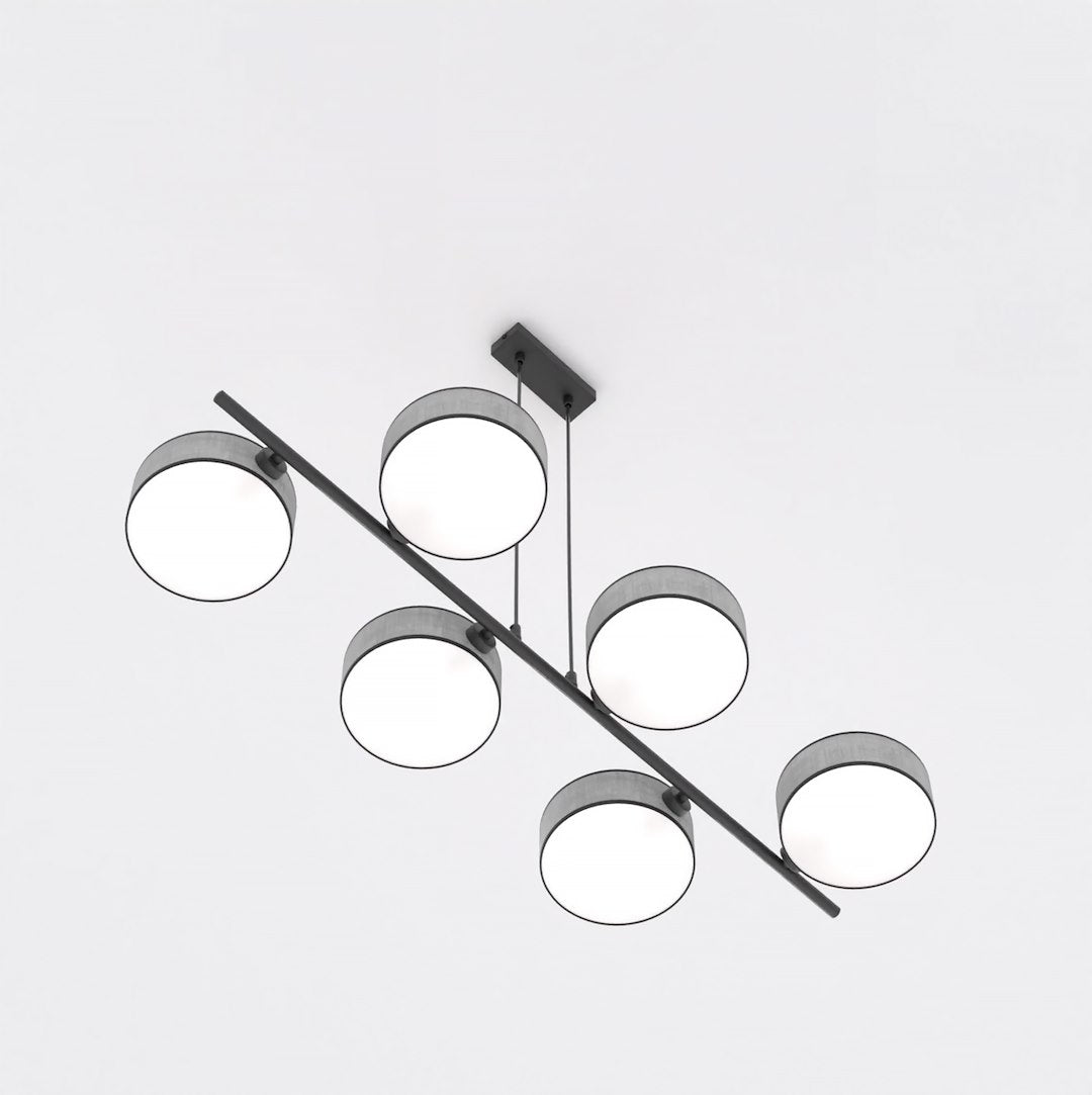 Vue plongeante du luminaire avec six lumières réparties en quinconce sur deux rangées.