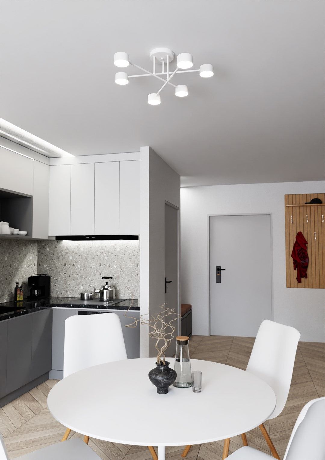 Luminaire six lumières au-dessus d'une table ronde dans un intérieur clair