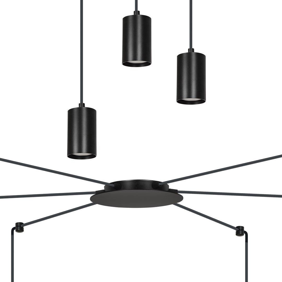 Détail rapproché des spots cylindriques noirs et de la rosace centrale