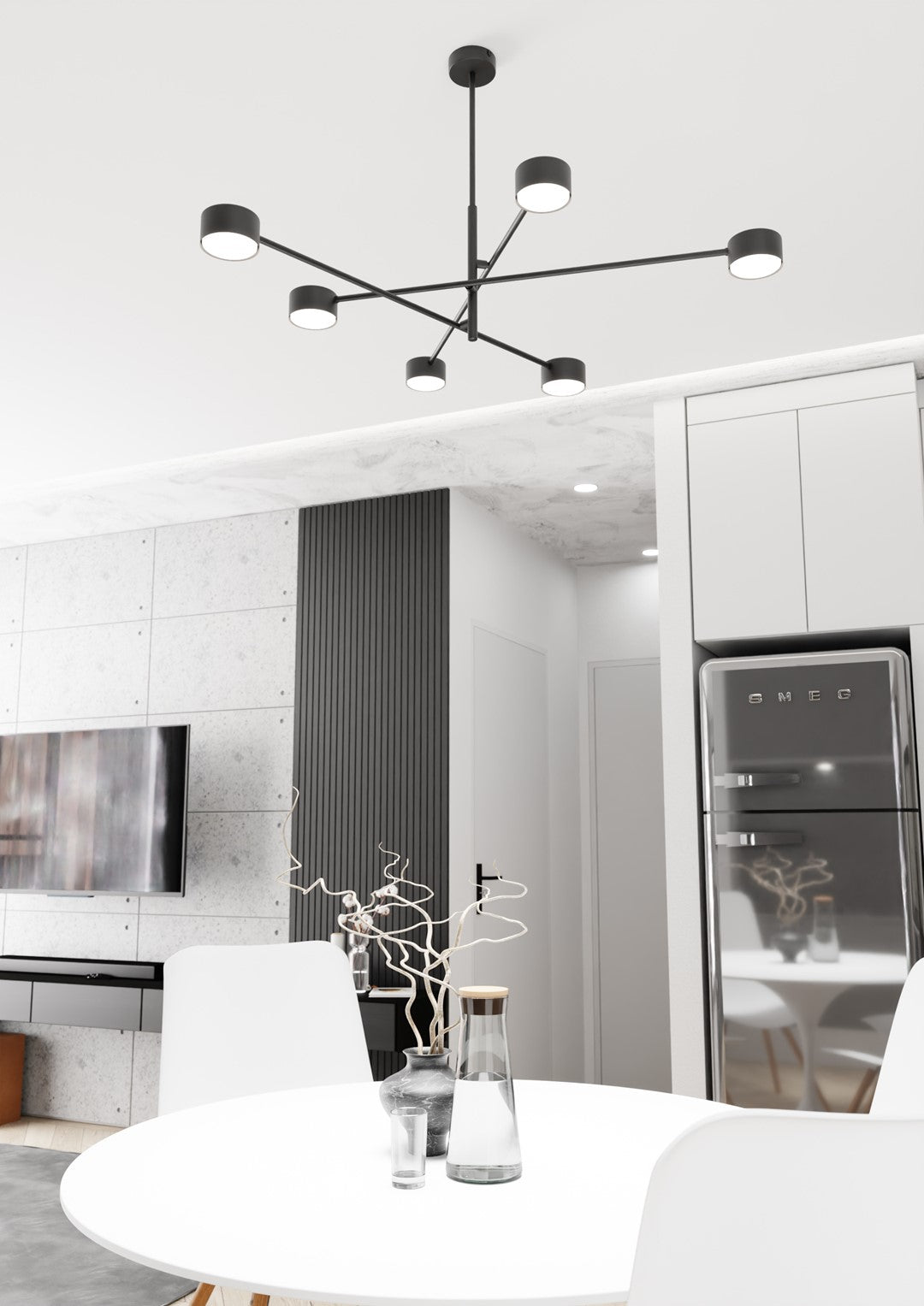 Luminaire installé au plafond au-dessus d'une table blanche, cuisine en arrière-plan.