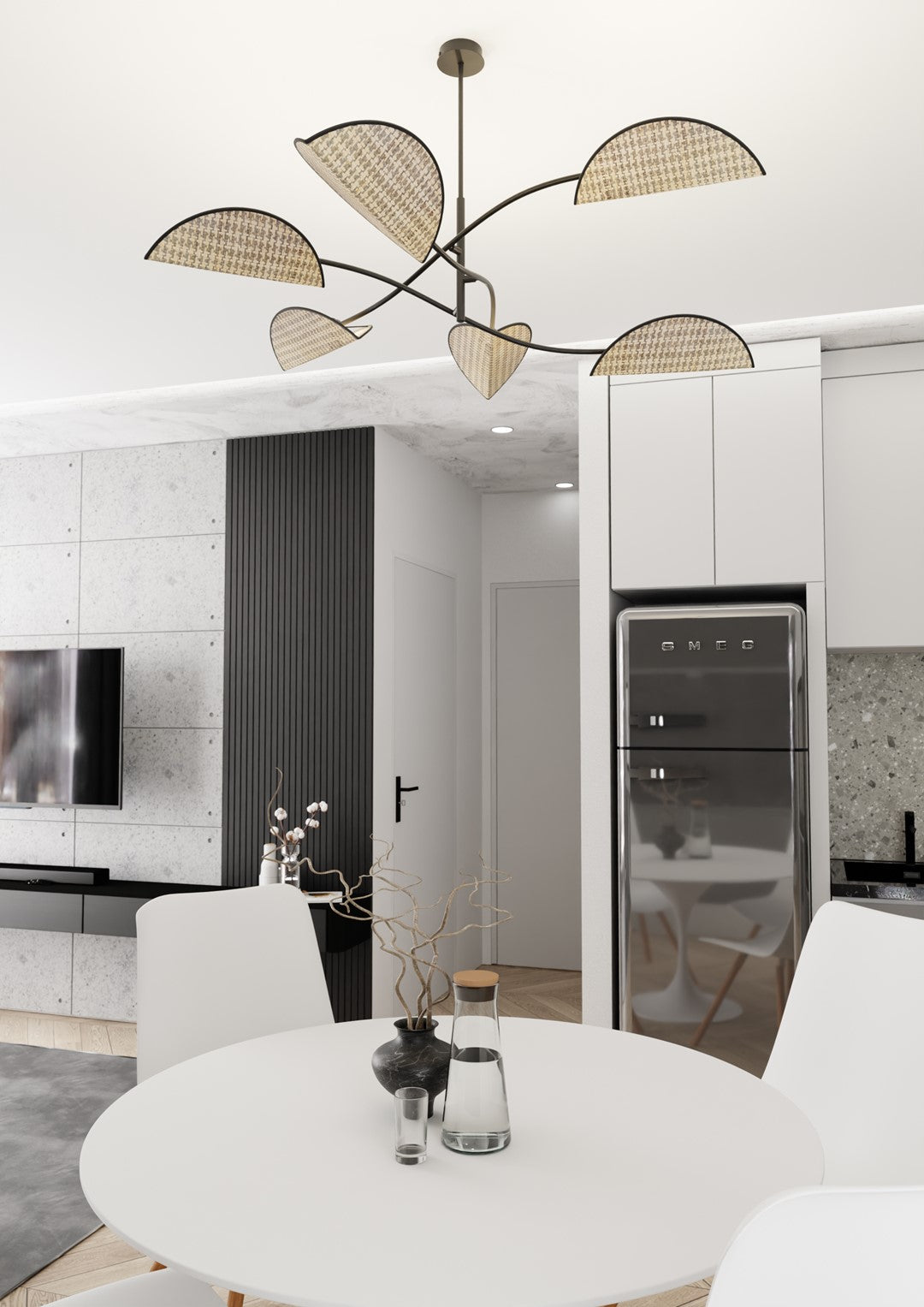 Plan rapproché de la suspension au-dessus d'une table blanche, dans un intérieur contemporain lumineux.
