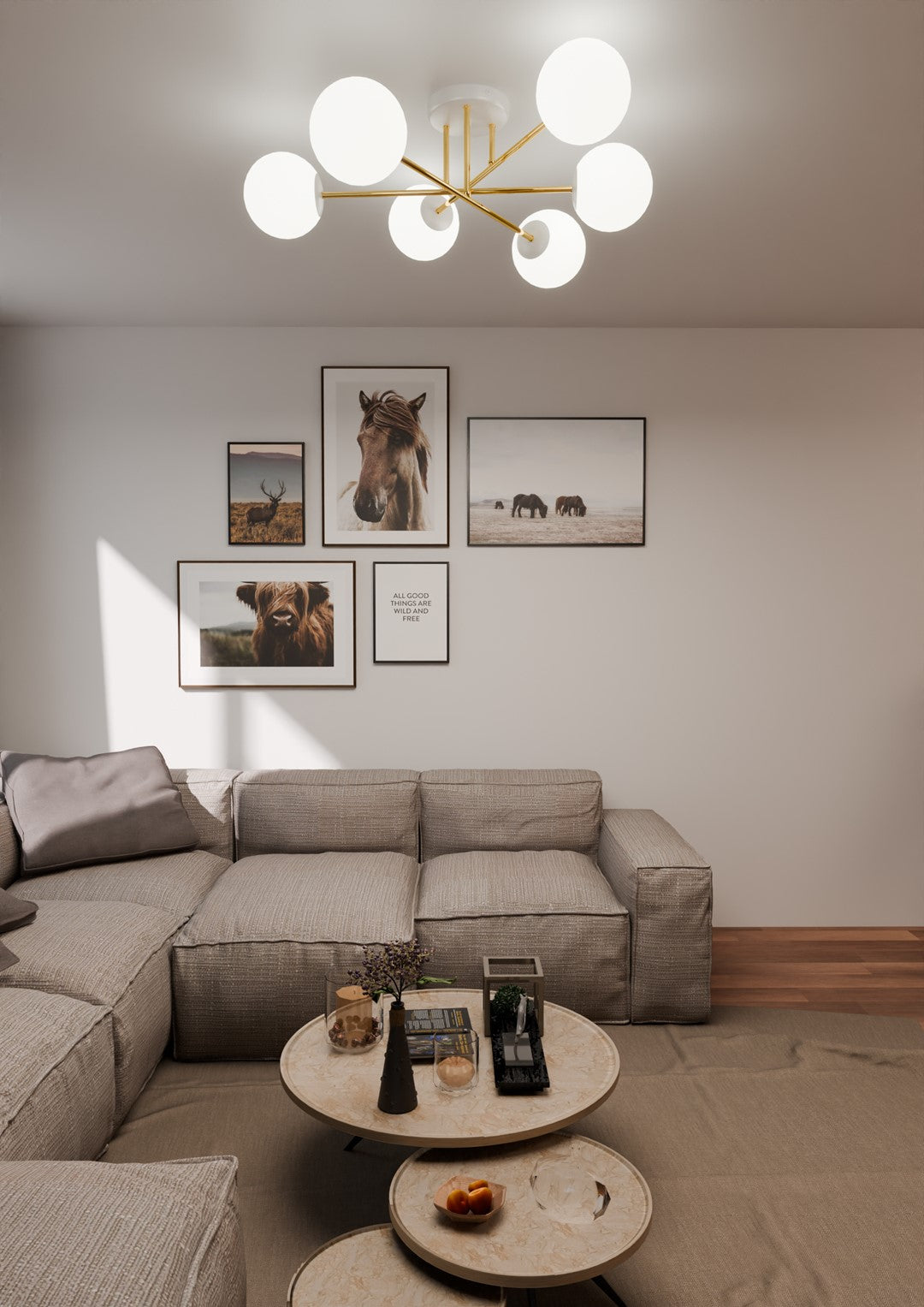 Luminaire allumé vu du dessous dans un salon, cadres animaliers au mur