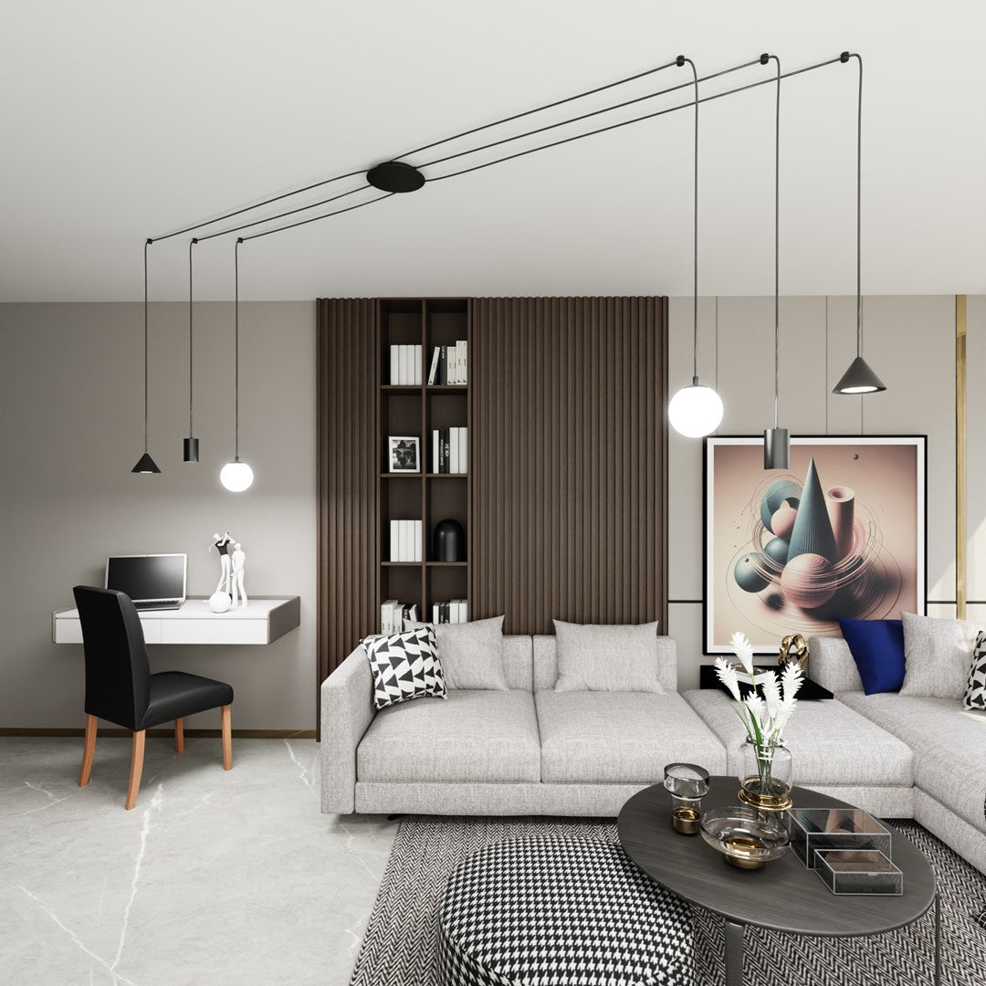 Suspension noire six lumières installée dans un intérieur contemporain avec canapé et table basse.