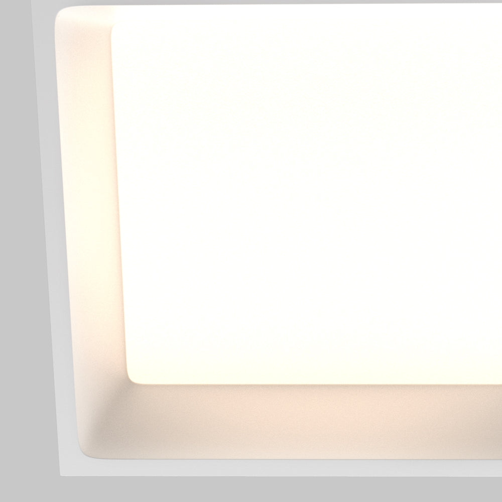 Détail du coin arrondi de la collerette blanche et du diffuseur lumineux