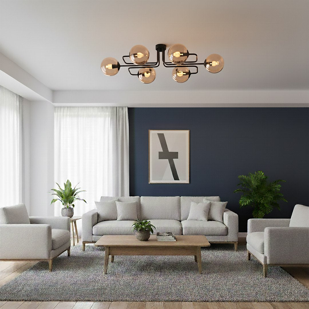 Plafonnier installé dans un salon moderne, canapé gris et mur bleu nuit