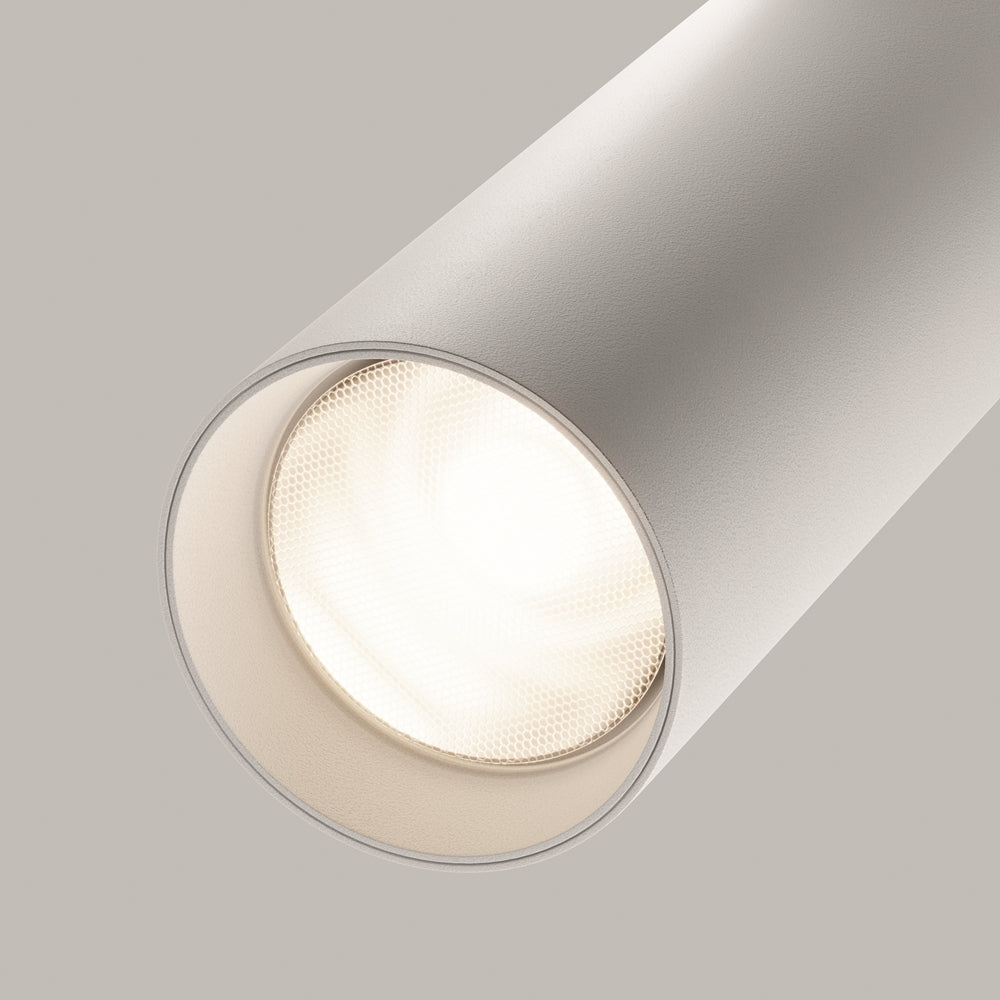 Détail de la lentille alvéolée et de l'intérieur crème du projecteur
