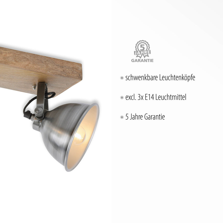 Détail d'un spot orientable avec douille E14, support bois et inscriptions en allemand sur garantie.
