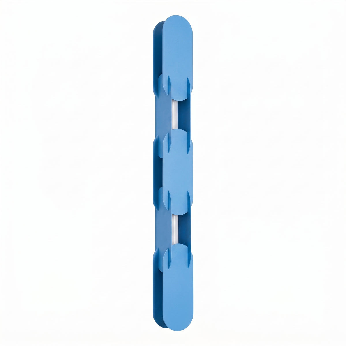 Version bleu clair de l'applique, montrant la superposition des plaques arrondies.