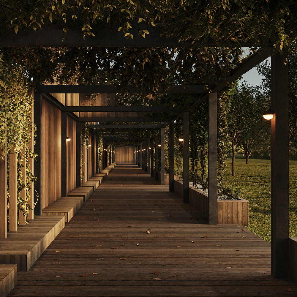 Mise en ambiance dans une allée de pergola en bois éclairée au crépuscule