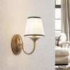 Applique murale Lumiel en tissu, crème et laiton ancien, hauteur 27 cm