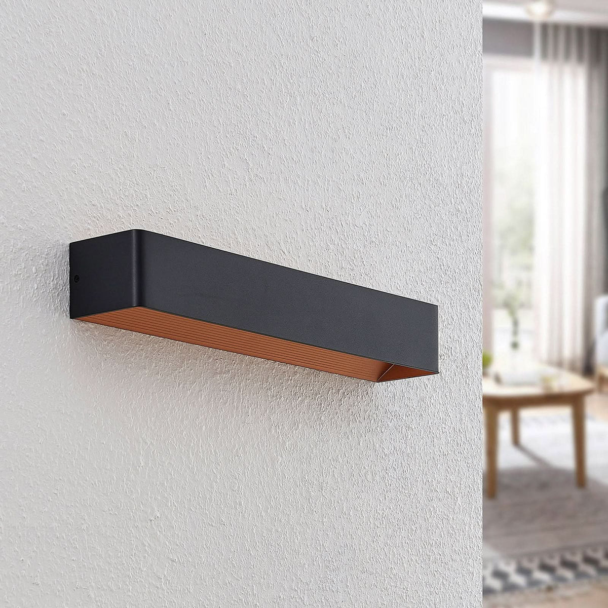 Applique murale LED Karam en aluminium, noir et doré, hauteur 8 cm, 3000 K, 13,7 W