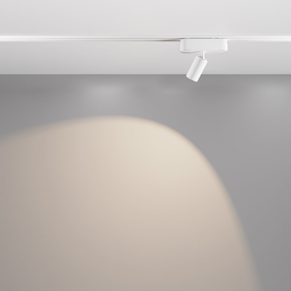 Mise en ambiance, faisceau lumineux projeté sur mur gris par le spot