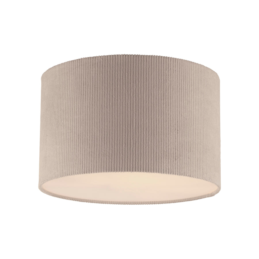 Vue de face de l'abat-jour cylindrique beige sur fond blanc neutre