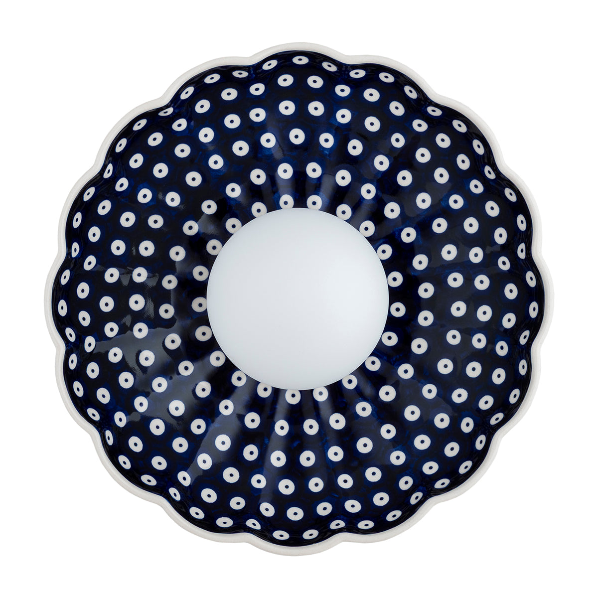 Face avant de l'applique allumée, halo lumineux autour du diffuseur