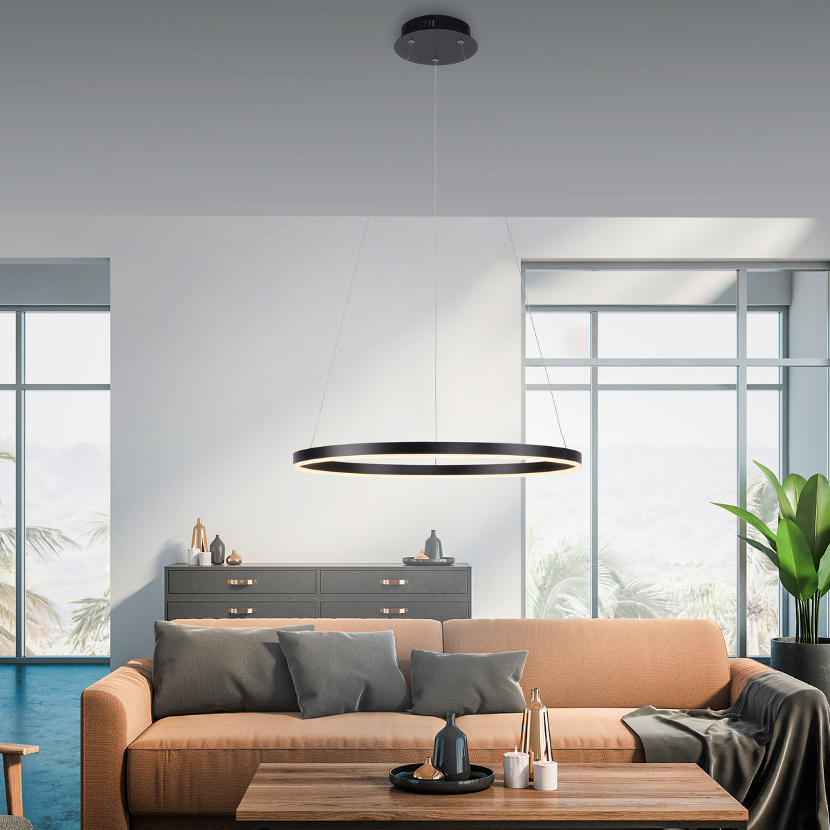 Mise en ambiance du salon moderne, suspension annulaire éclairant le canapé