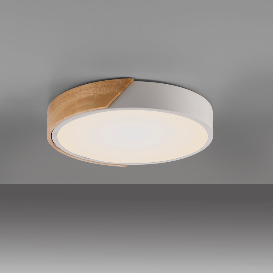 Plafonnier installé au plafond, éclairage chaud allumé, fond gris