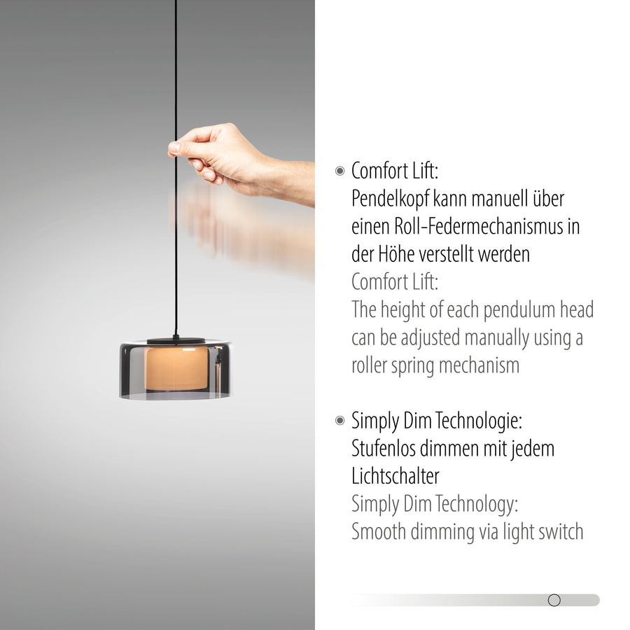 Détail : main réglant la hauteur du luminaire par mécanisme Comfort Lift