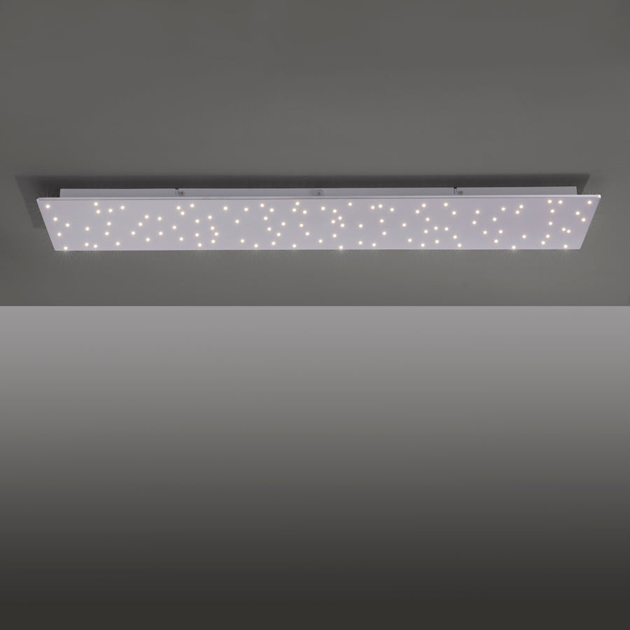 Luminaire fixé au plafond, éclairage scintillant dans une pièce grise