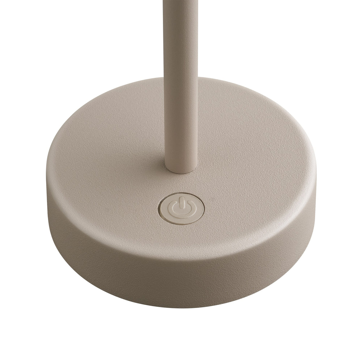 Détail du socle rond avec bouton tactile intégré et finition grainée beige.
