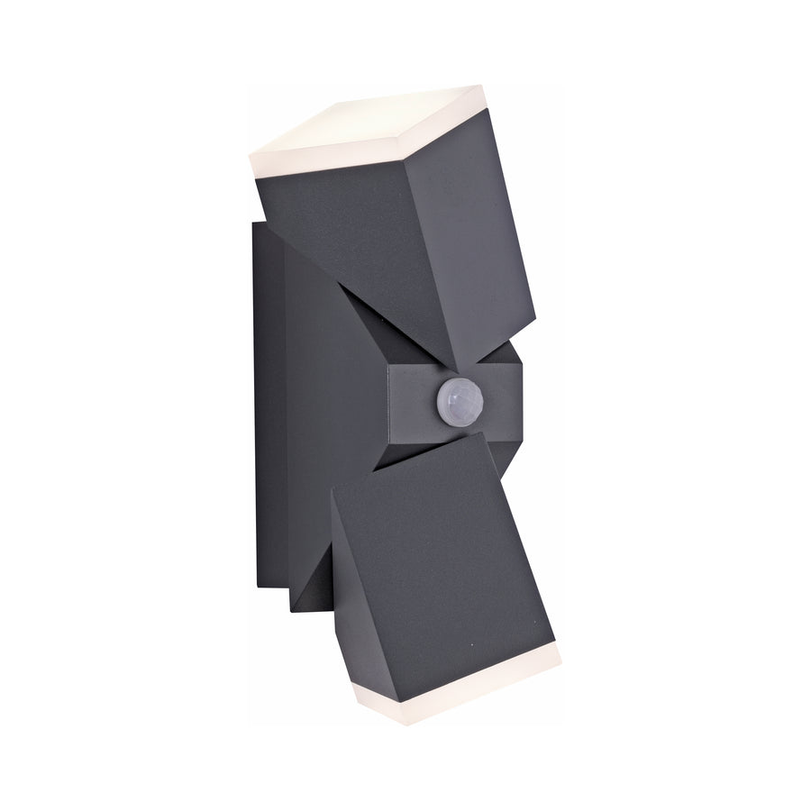 Vue rapprochée de l'applique anthracite inclinée, montrant les blocs décalés, le détecteur et les diffuseurs blancs.