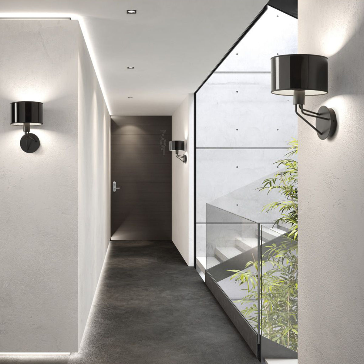 Mise en scène dans un couloir béton avec appliques noires allumées de chaque côté