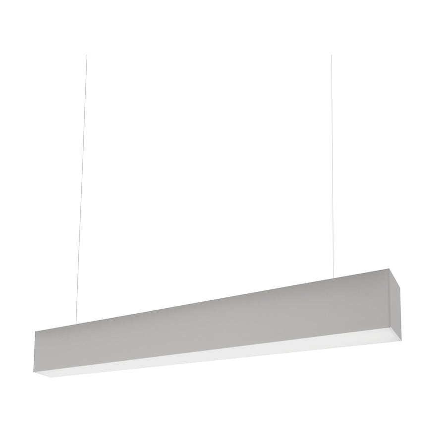 Vue de trois quarts du luminaire gris clair, mettant en valeur sa forme allongée.