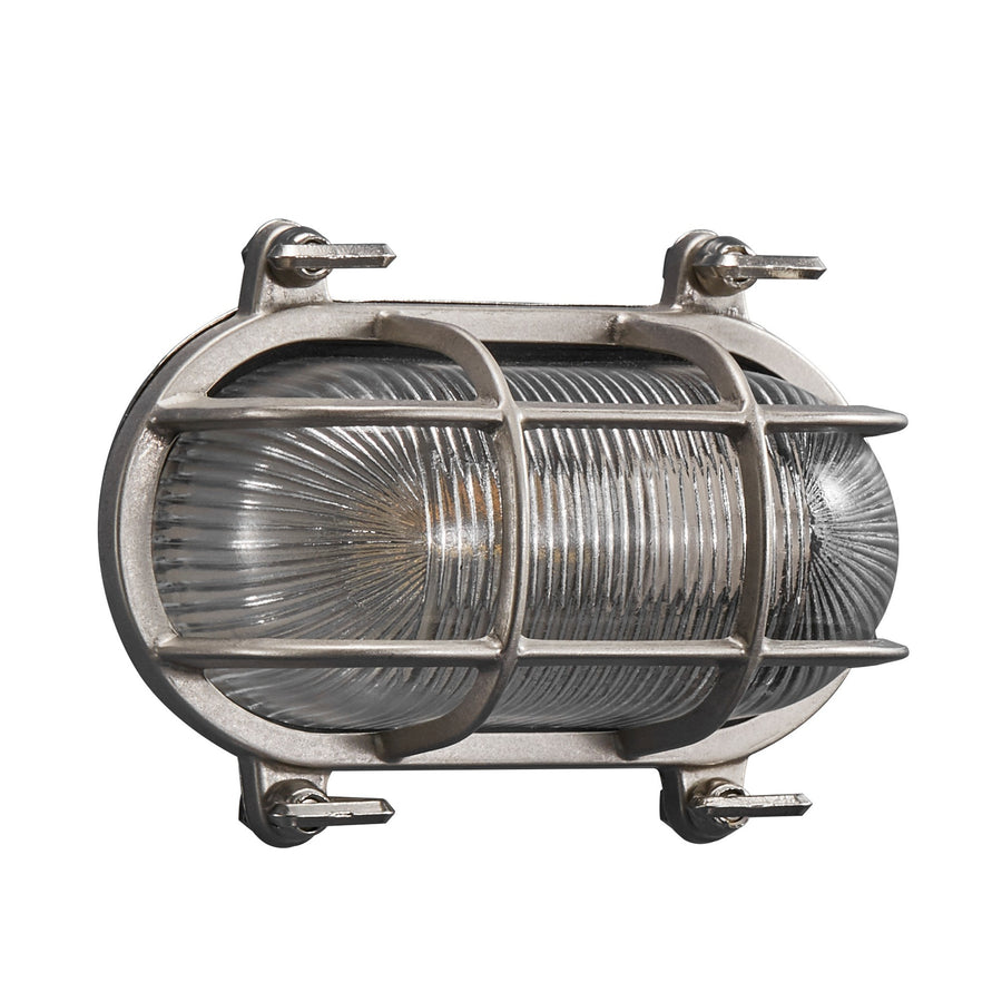 Vue de face de l'applique éteinte, verre transparent et grille de protection