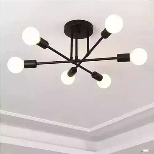 Version noire du plafonnier à six globes blancs, montée sur plafond blanc.
