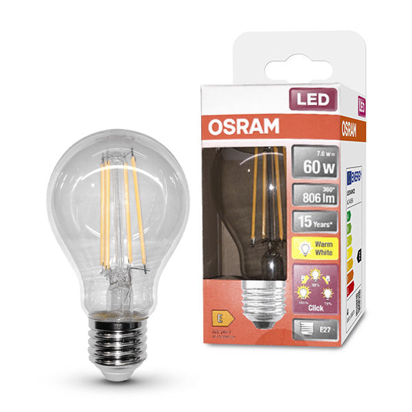 Ampoule posée à côté de son emballage carton Osram mentionnant 7,4 W et culot E27