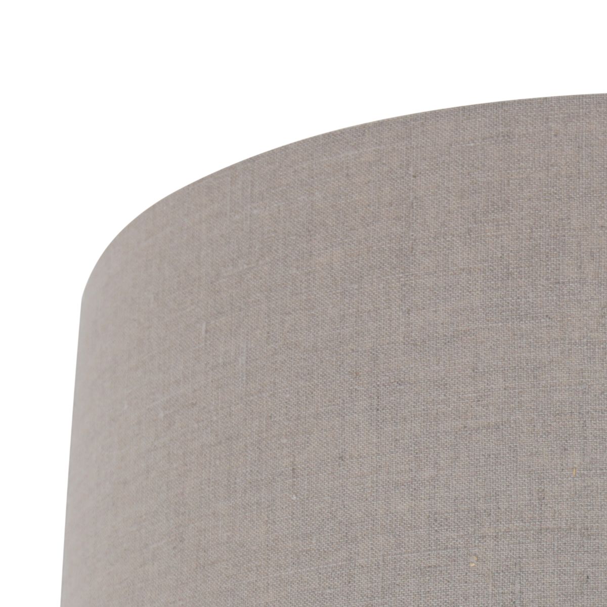 Gros plan sur la texture du lin gris et la couture du bord supérieur