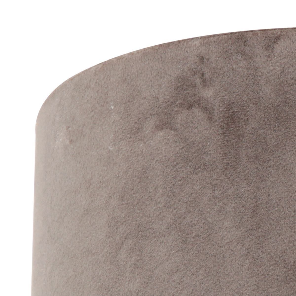 Gros plan sur le tissu velours et la couture du bord supérieur