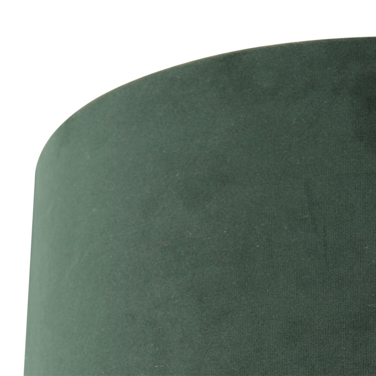 Détail du bord supérieur arrondi et de la finition velours vert.