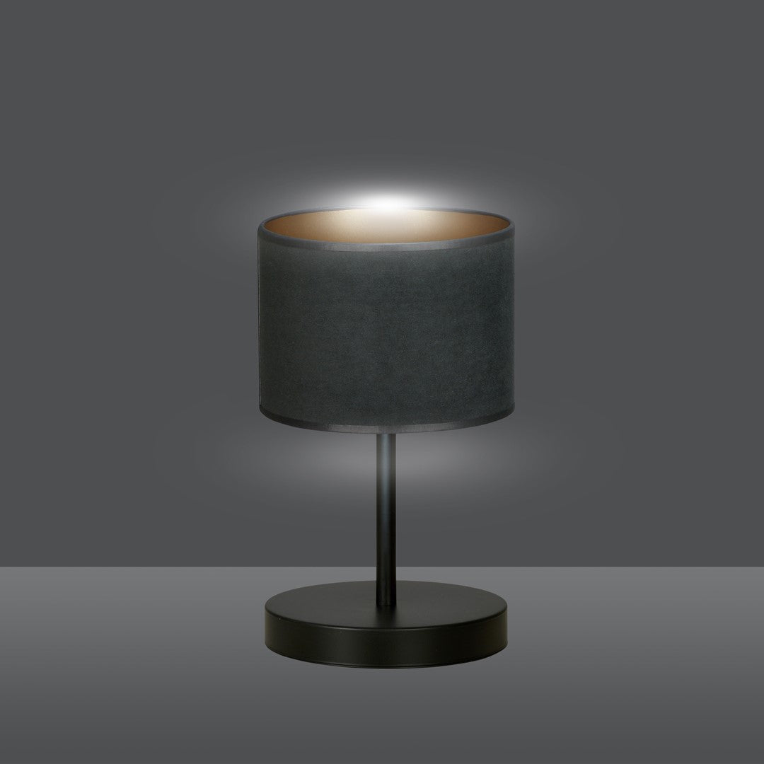 Lampe allumée diffusant une lumière chaude vers le haut