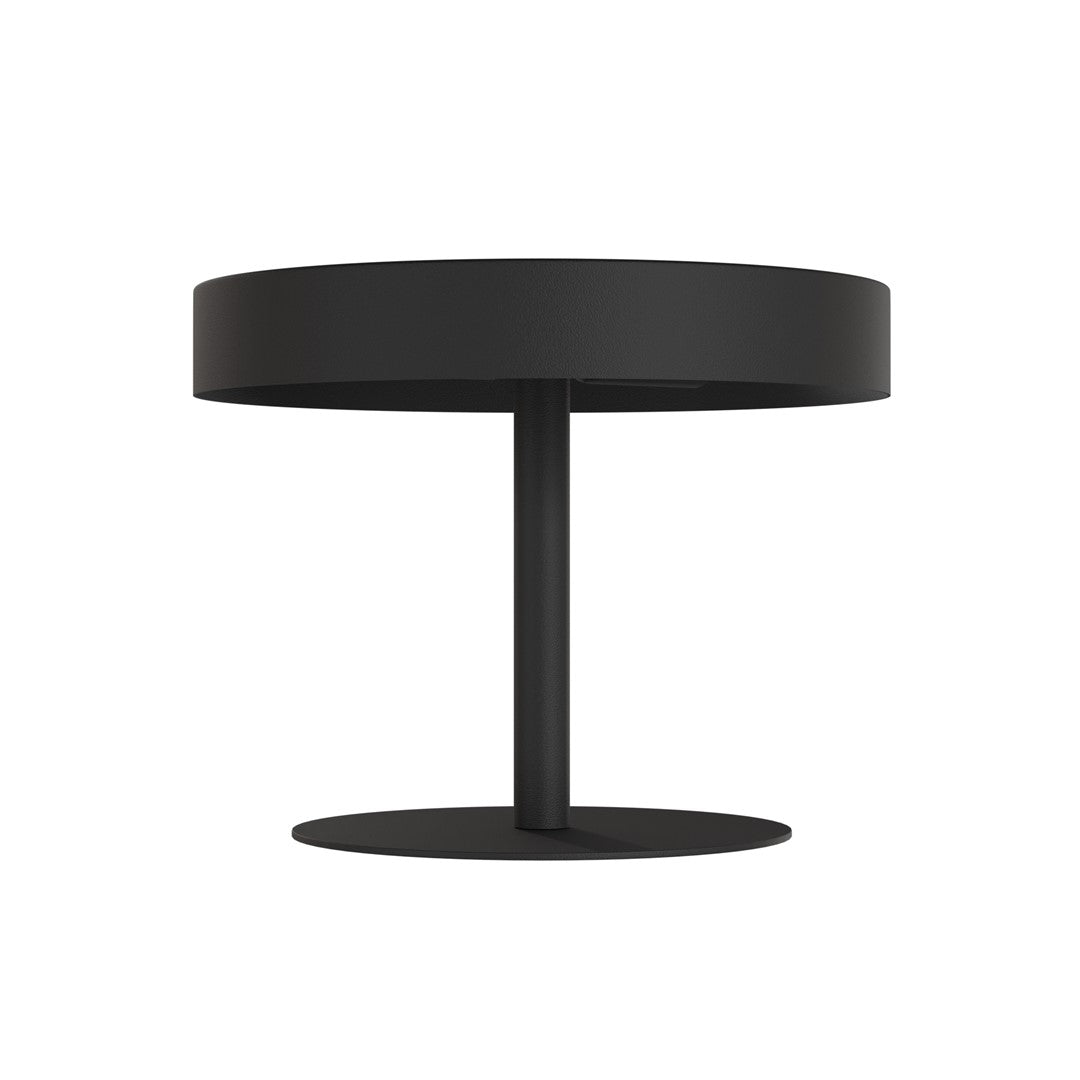 Silhouette du luminaire sur fond blanc, disque épais et pied étroit