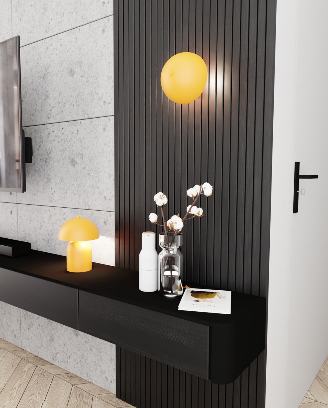Luminaire orange posé sur un meuble TV noir devant un mur lambrissé