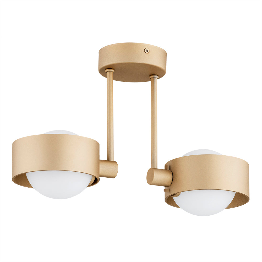 Version dorée avec diffuseur blanc et abat-jour cylindrique, vue rapprochée