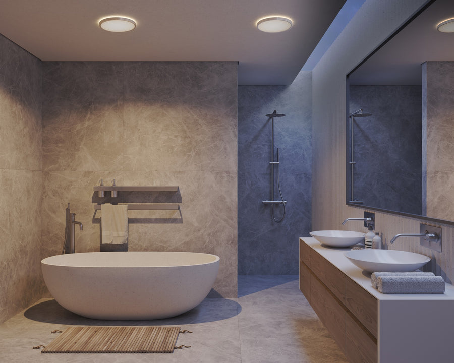 Ambiance nocturne de salle de bain, plafonniers ronds en lumière chaude tamisée