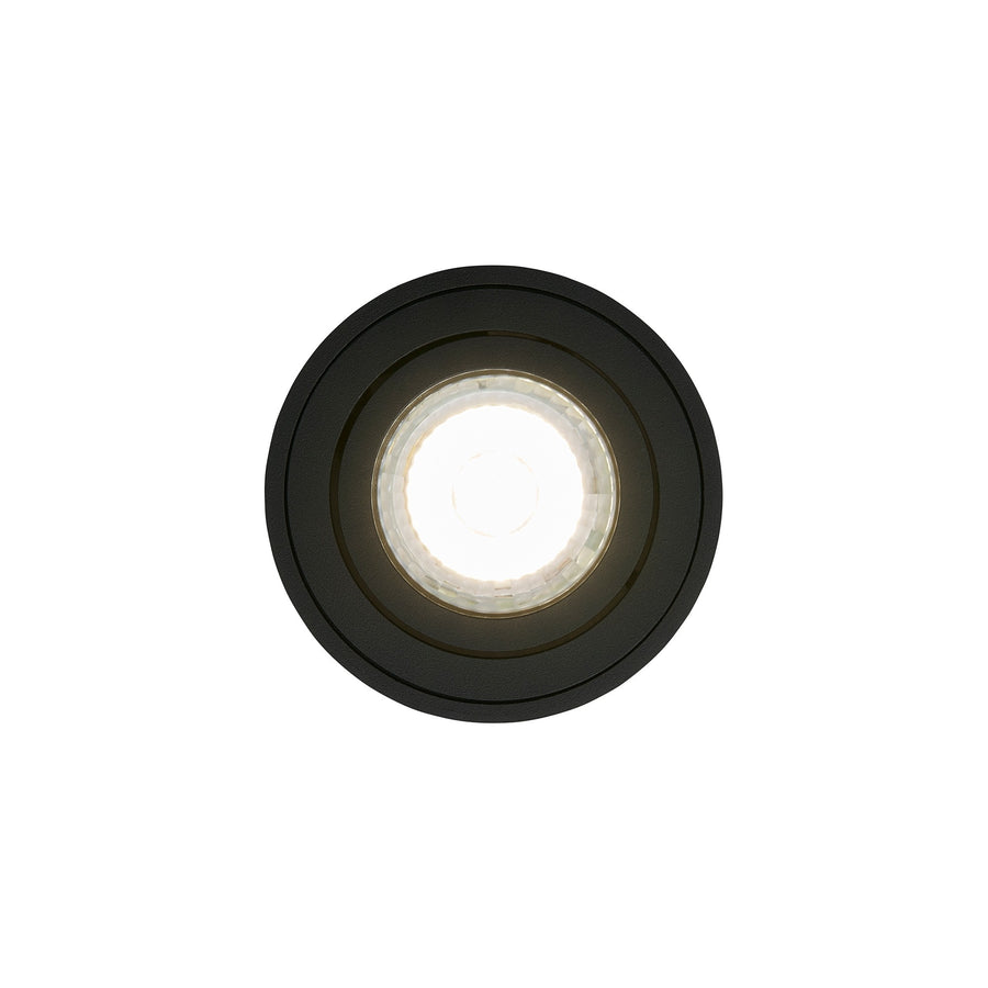 Vue de dessous du spot noir, cercles concentriques et diffuseur lumineux