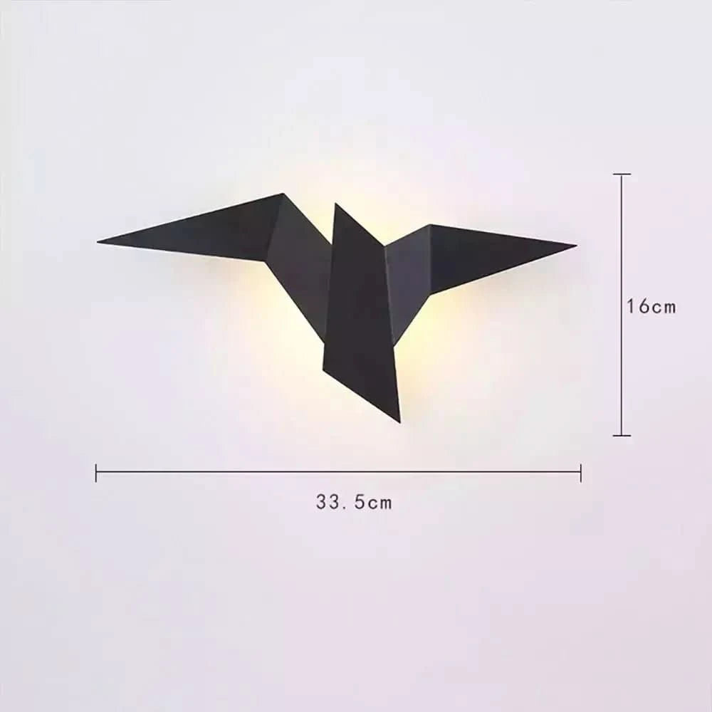 Schéma de dimensions indiquant 33,5 cm de largeur et 16 cm de hauteur pour l'applique noire.
