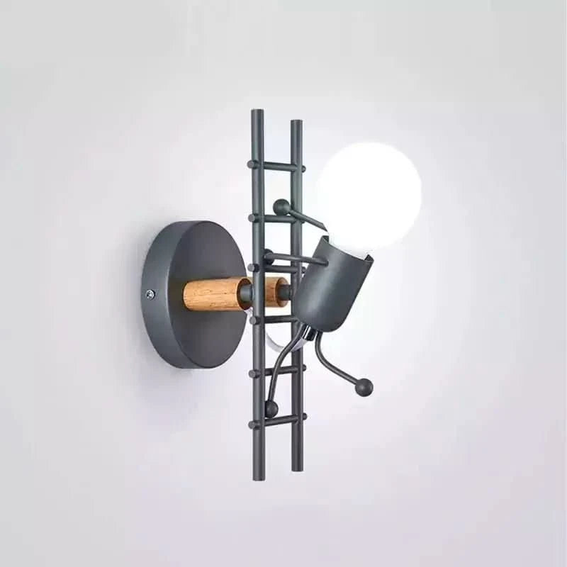 Photo produit sur fond gris : applique murale noire avec échelle et silhouette de bonhomme.