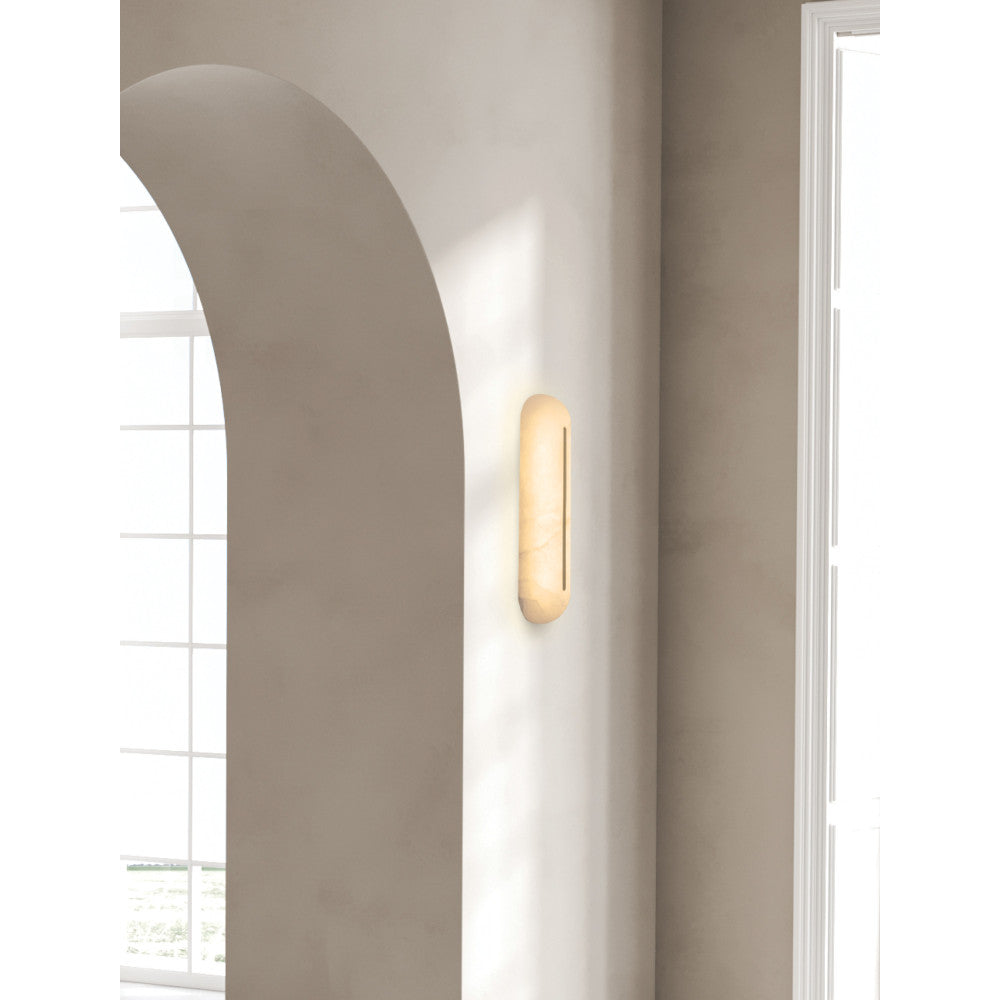 Mise en situation murale près d'une arche, lumière chaude diffusée par l'applique
